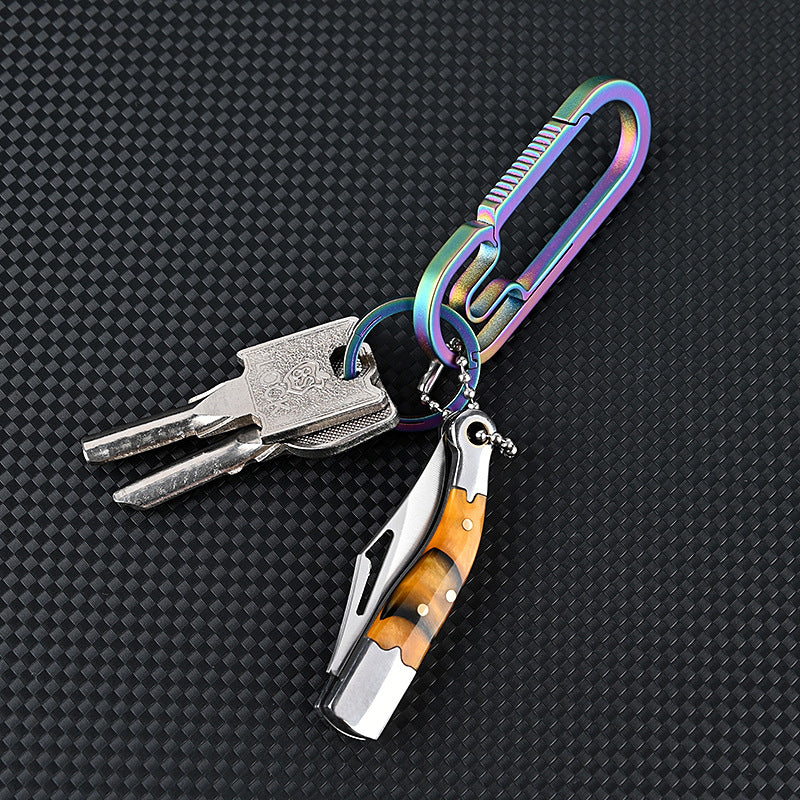 MASALONG MA-TY-018 Mini cuchillo plegable de acero inoxidable Cuchillo afilado para camarones Desembalaje de cajas exprés Cuchillo para abrir Llavero colgante Cuchillo para frutas Autodefensa