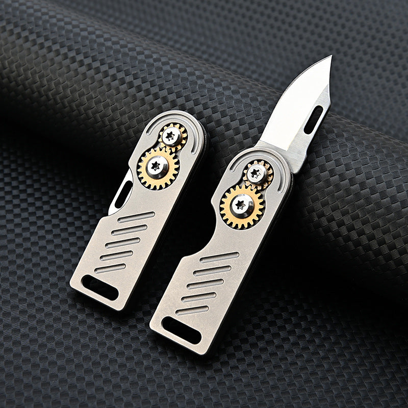 MASALONG MA-TY-059 Titanium alloy gear small blade with sharp edge and high hardness D2 steel mini folding knife, portable keychain, unboxing and express delivery knife