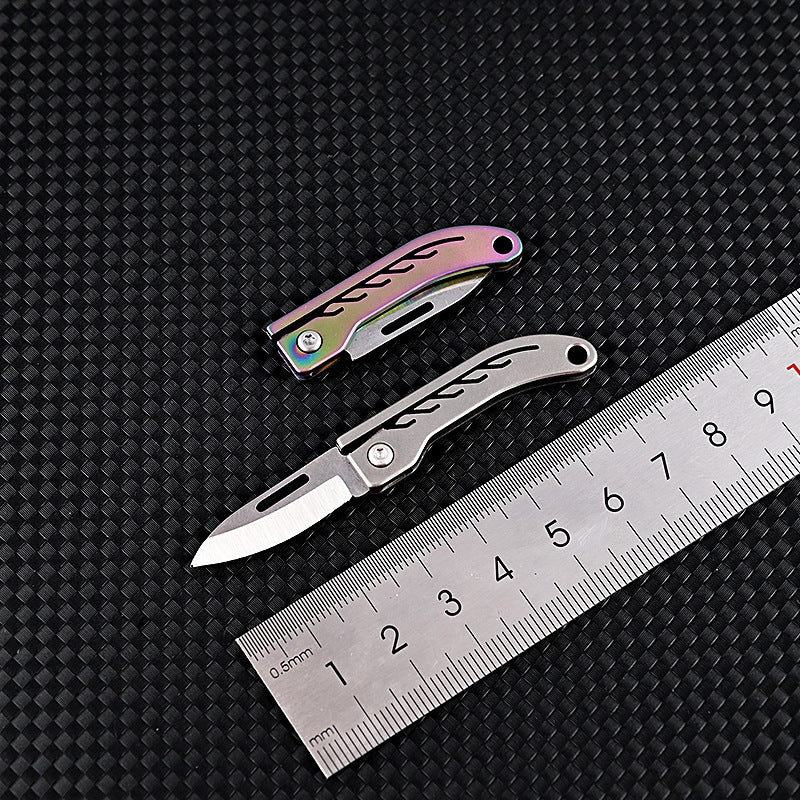 MASALONG MA-TY-048 Mini cuchillo plegable de aleación de titanio Llavero portátil con acero D2 de alta dureza Cuchillo afilado Cuchillo de entrega portátil y sin embalaje