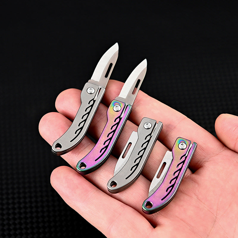 MASALONG MA-TY-048 Mini cuchillo plegable de aleación de titanio Llavero portátil con acero D2 de alta dureza Cuchillo afilado Cuchillo de entrega portátil y sin embalaje