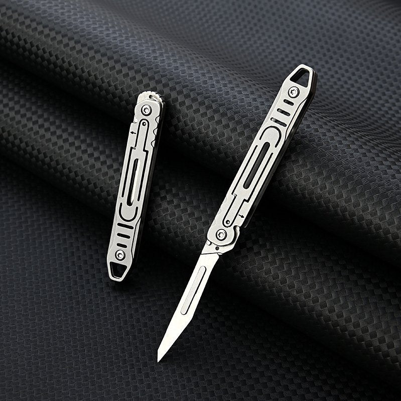 MASALONG MA-TY-011 Cuchillo de arte de acero inoxidable Cuchillo plegable pequeño de apertura rápida Cuchillo de papel de corte afilado Llavero portátil Cuchillo exprés de caja abierta portátil