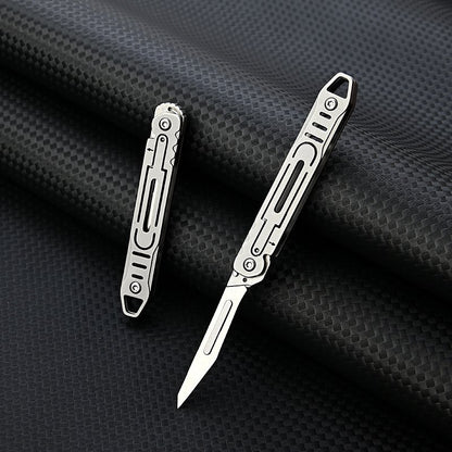 MASALONG MA-TY-011 Cuchillo de arte de acero inoxidable Cuchillo plegable pequeño de apertura rápida Cuchillo de papel de corte afilado Llavero portátil Cuchillo exprés de caja abierta portátil