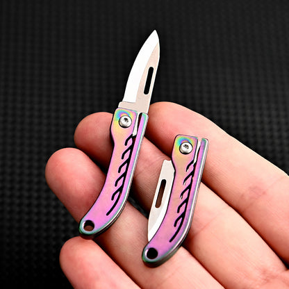 MASALONG MA-TY-048 Mini cuchillo plegable de aleación de titanio Llavero portátil con acero D2 de alta dureza Cuchillo afilado Cuchillo de entrega portátil y sin embalaje