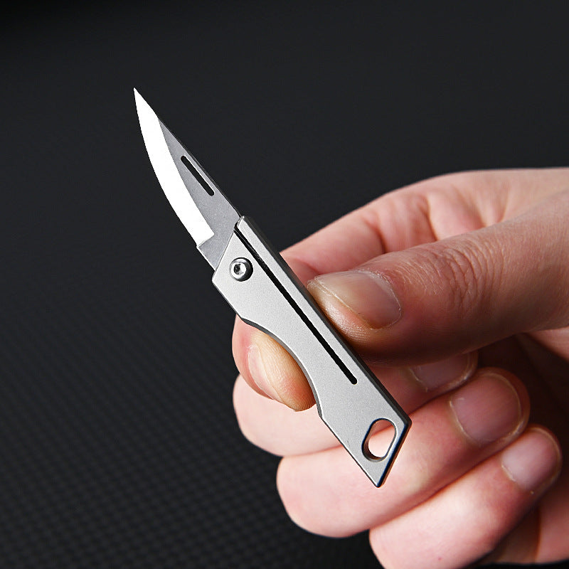 MASALONG MA-TY-007 Mini faca dobrável de liga de titânio, faca pequena afiada de aço D2 de alta dureza, chaveiro portátil, peças para pendurar, desembalar, entrega expressa e desembalar faca pequena