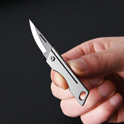 MASALONG MA-TY-007 Mini faca dobrável de liga de titânio, faca pequena afiada de aço D2 de alta dureza, chaveiro portátil, peças para pendurar, desembalar, entrega expressa e desembalar faca pequena