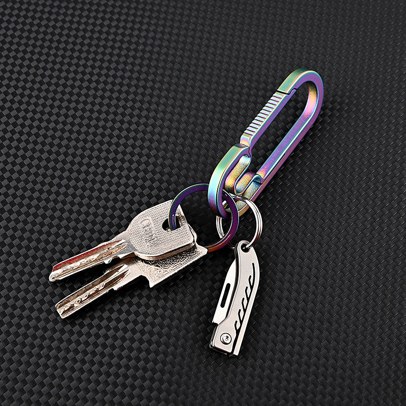 MASALONG MA-TY-048 Mini cuchillo plegable de aleación de titanio Llavero portátil con acero D2 de alta dureza Cuchillo afilado Cuchillo de entrega portátil y sin embalaje
