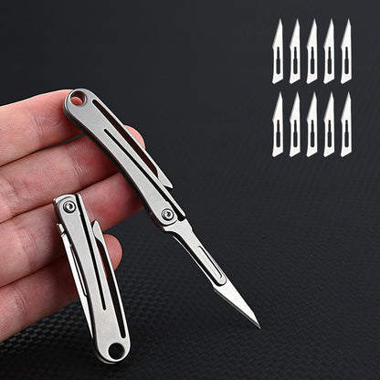 MASALONG MA-TY-012 Mini cuchillo plegable de aleación de titanio, cuchillo afilado para cortar papel artístico, hoja reemplazable, desempaquetado y desempaquetado portátil, cuchillo llavero de entrega exprés