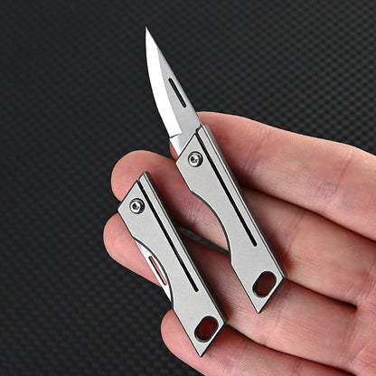 MASALONG MA-TY-007 Mini faca dobrável de liga de titânio, faca pequena afiada de aço D2 de alta dureza, chaveiro portátil, peças para pendurar, desembalar, entrega expressa e desembalar faca pequena