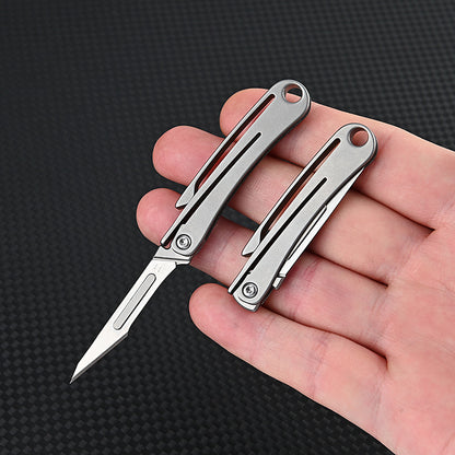 MASALONG MA-TY-012 Mini cuchillo plegable de aleación de titanio, cuchillo afilado para cortar papel artístico, hoja reemplazable, desempaquetado y desempaquetado portátil, cuchillo llavero de entrega exprés
