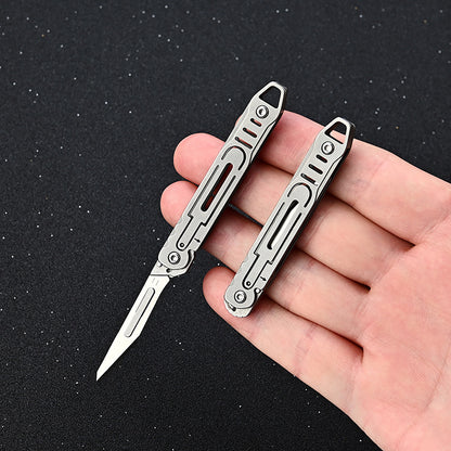MASALONG MA-TY-011 Cuchillo de arte de acero inoxidable Cuchillo plegable pequeño de apertura rápida Cuchillo de papel de corte afilado Llavero portátil Cuchillo exprés de caja abierta portátil