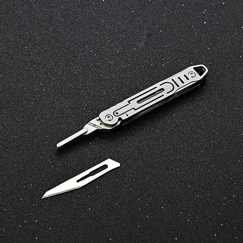 MASALONG MA-TY-011 Cuchillo de arte de acero inoxidable Cuchillo plegable pequeño de apertura rápida Cuchillo de papel de corte afilado Llavero portátil Cuchillo exprés de caja abierta portátil