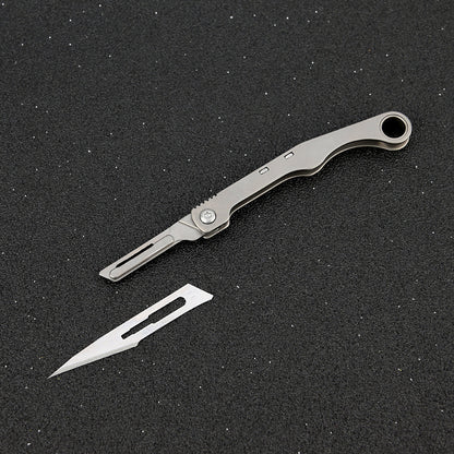 MASALONG MA-TY-028 Cuchillo pequeño Eagle Falcon de aleación de titanio, cuchillo afilado para cortar papel artístico, hoja intercambiable, llavero portátil, cuchillo exprés