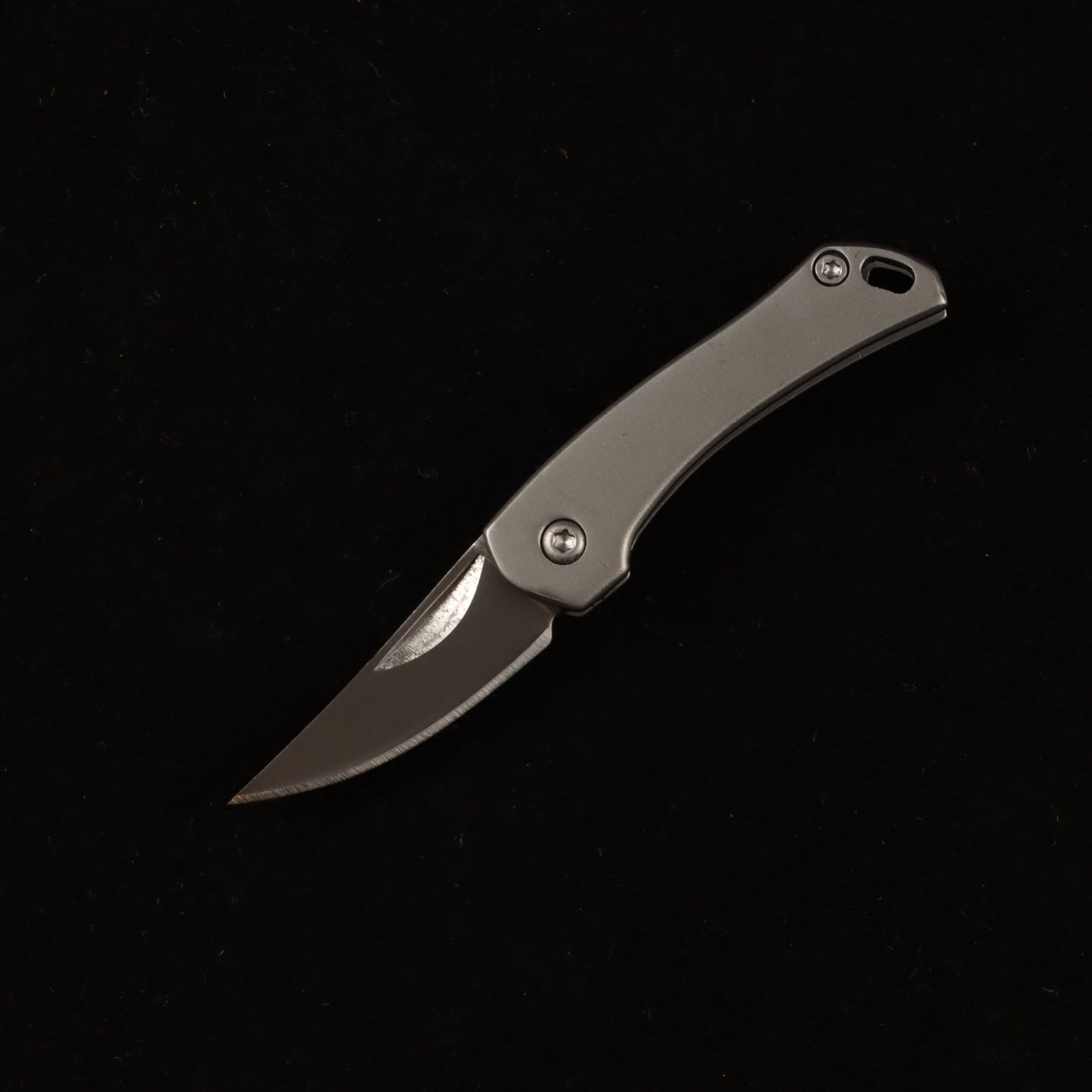MASALONG MA-TY-014 Unboxing a high-hardness, mini stainless steel folding tool—a portable keychain accessory with a creative design.