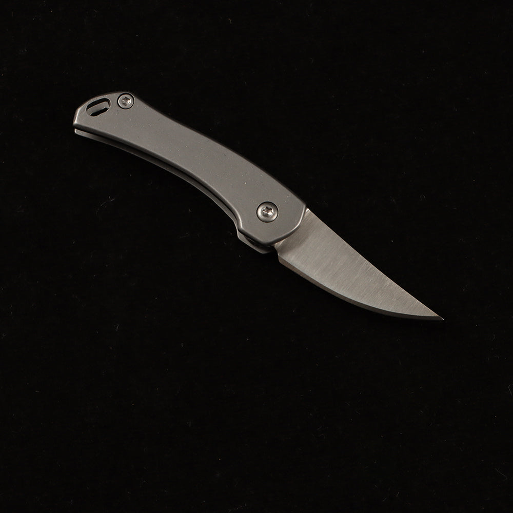 MASALONG MA-TY-014 Unboxing a high-hardness, mini stainless steel folding tool—a portable keychain accessory with a creative design.