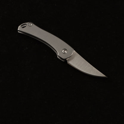 MASALONG MA-TY-014 Unboxing a high-hardness, mini stainless steel folding tool—a portable keychain accessory with a creative design.
