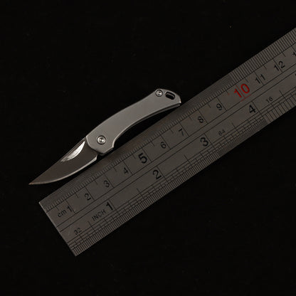 MASALONG MA-TY-014 Unboxing a high-hardness, mini stainless steel folding tool—a portable keychain accessory with a creative design.